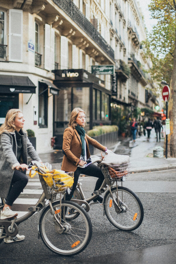 Two women cycling 