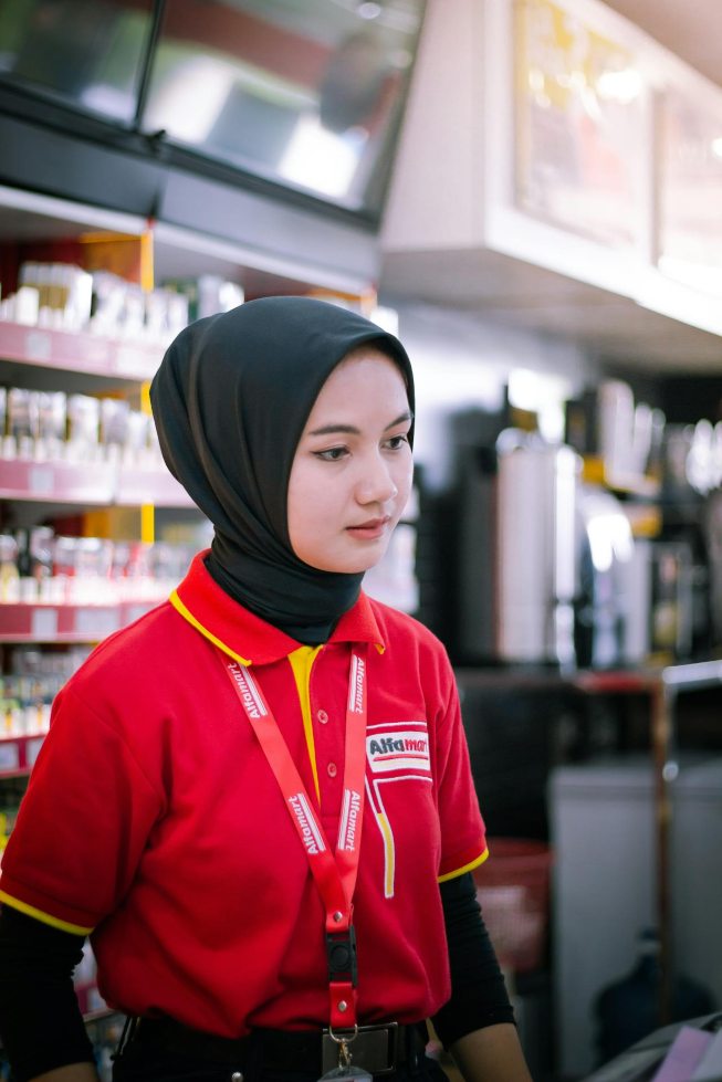 a girl working in a convenience store